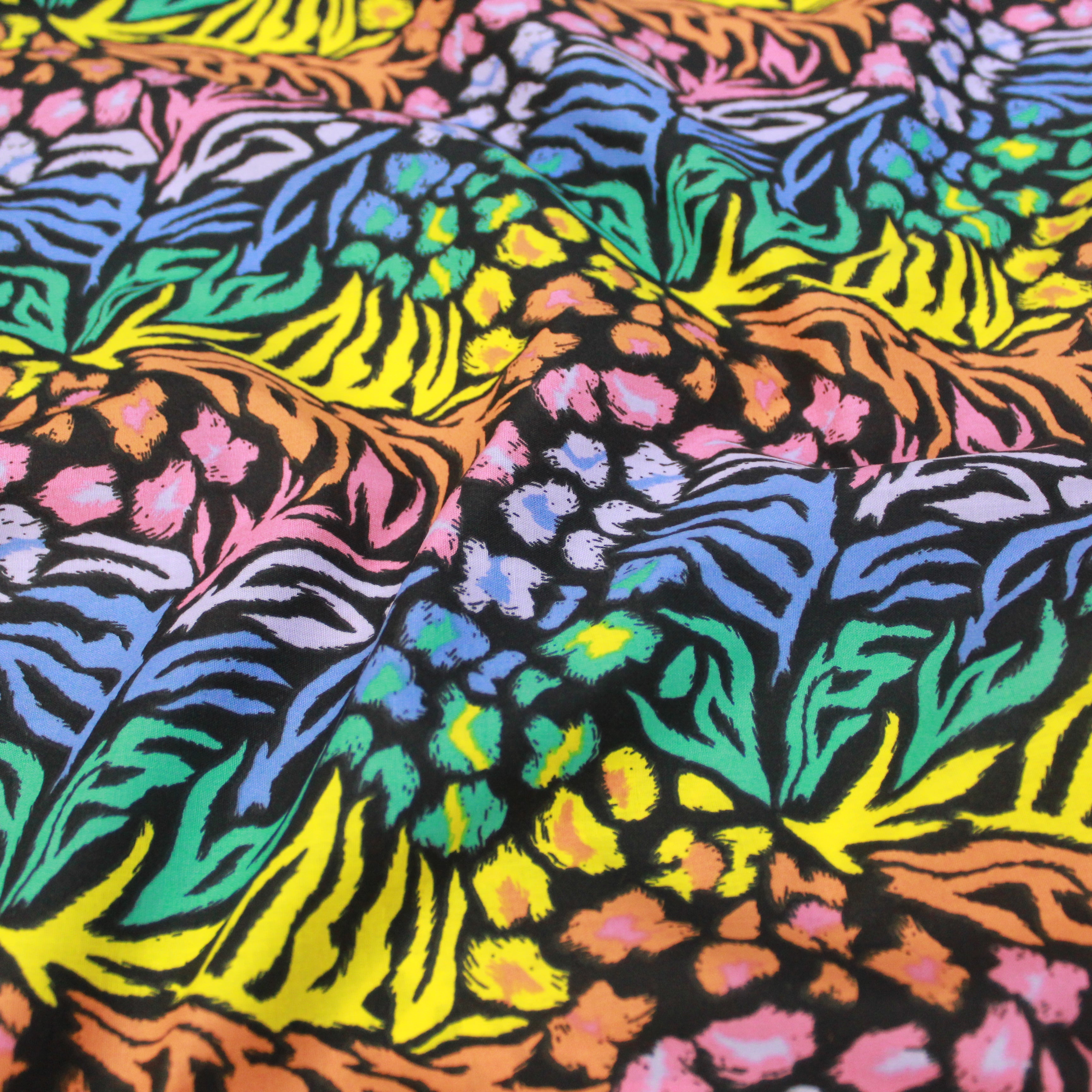 Per Metre, Top Quality Poly-Cotton "Multicoloured Forest Leaf's" 44" wide Black