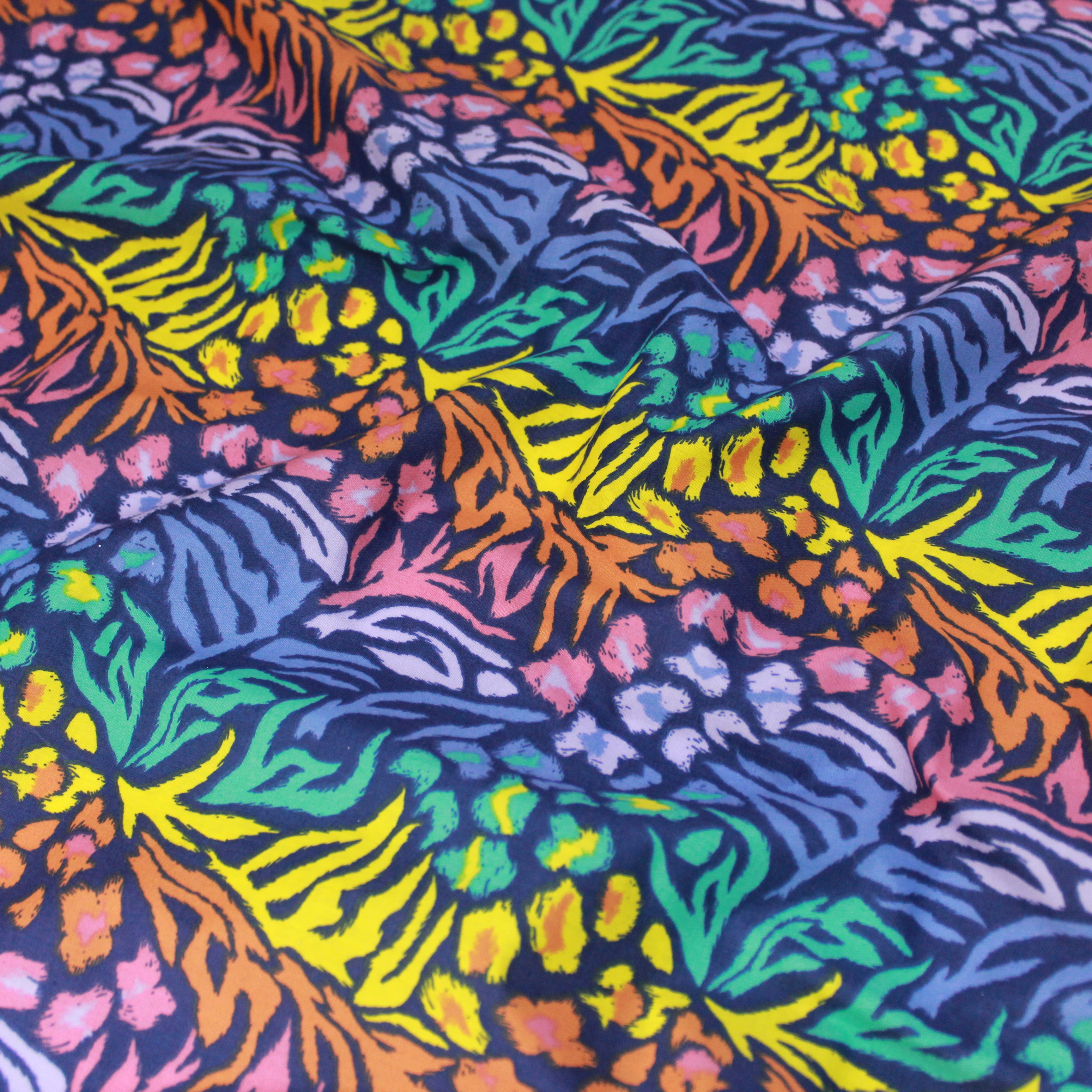 Per Metre, Top Quality Poly-Cotton "Multicoloured Forest Leaf's" 44" wide Midnight Blue